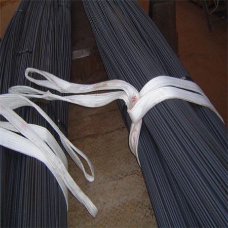 steel plant lifting sling wrapping bundles of threaded steel bar, the ribbed surface and the cut ends of the bars in direct contact with the webbing