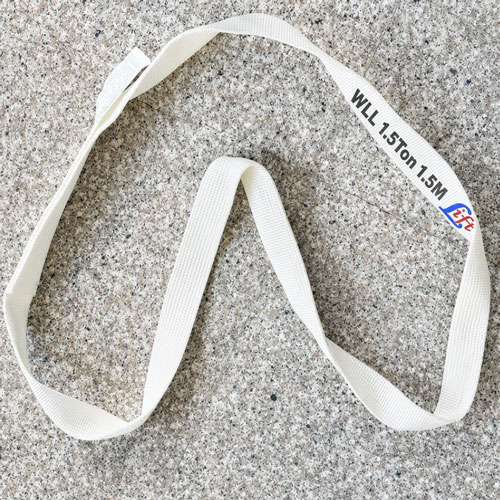 Single use lifting sling, white flat woven webbing loop marked WLL 1.5Ton 1.5M printed directly on the band
